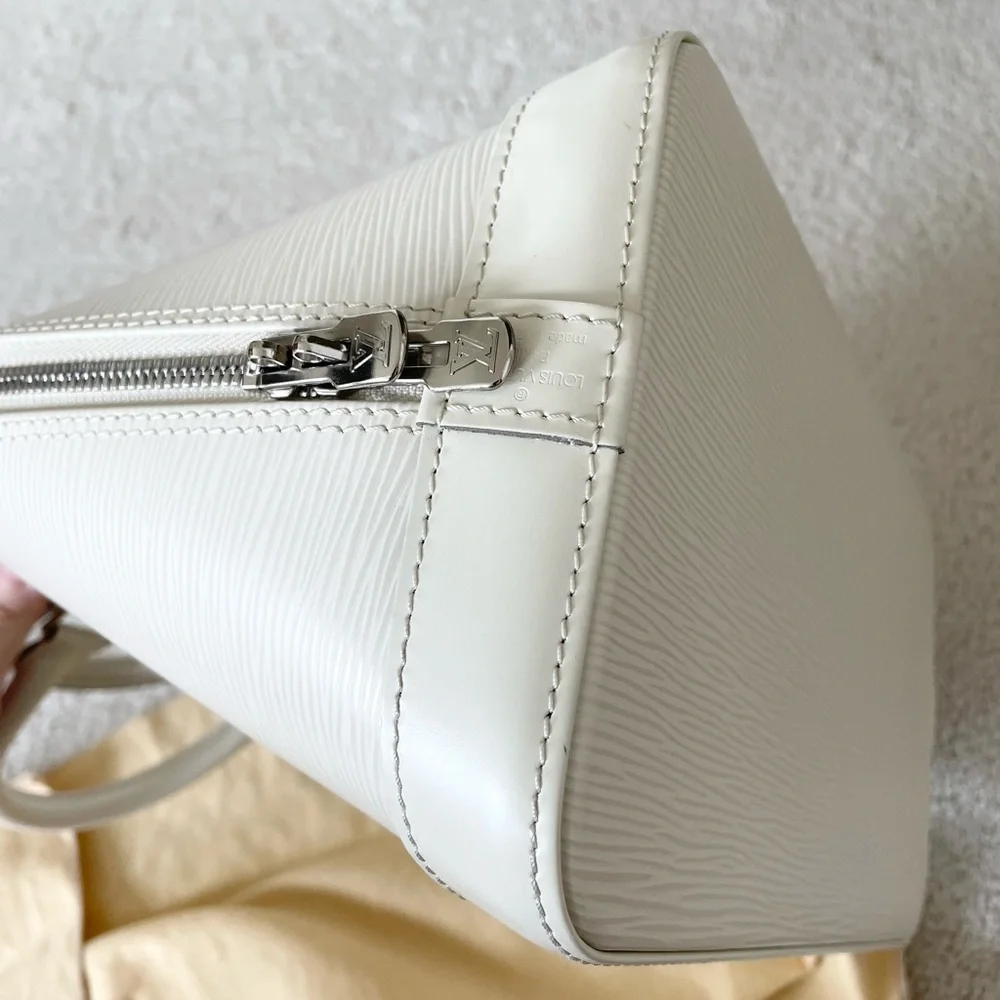 Authentic Louis Vuitton ivory EPI Alma PM bag